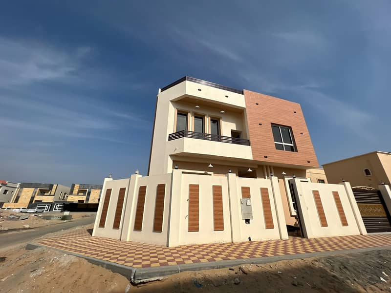 For sale villa in the Emirate of Ajman, a corner on two streets, a stone in full, a very impressive villa, a large area villa on an asphalt street