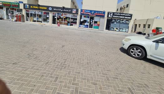 Shop for Sale in New Industrial City, Ajman - For sale Offer price, from the owner directly, 2 commercial shops rented 25,000 slab concerate