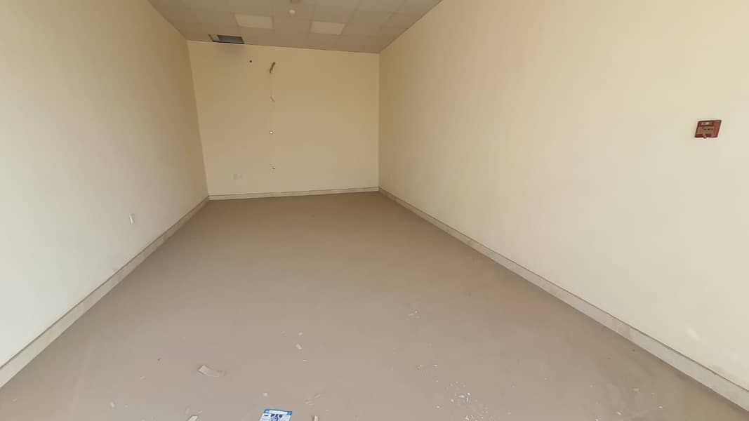 SHOP FOR RENT 500/SQFT  EASY PAYMENTS MAIN LOCATION IN AL SAJAA AREA NEAR GAS FACTORY