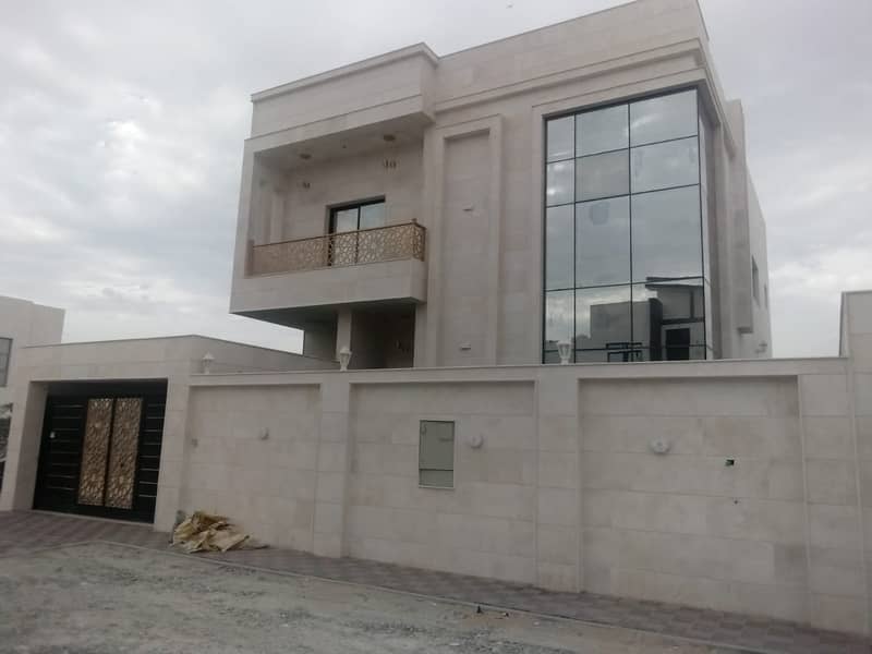 For sale, a villa in the most prestigious areas of Ajman, super deluxe finishing, freehold for all nationalities, with the possibility of bank financi