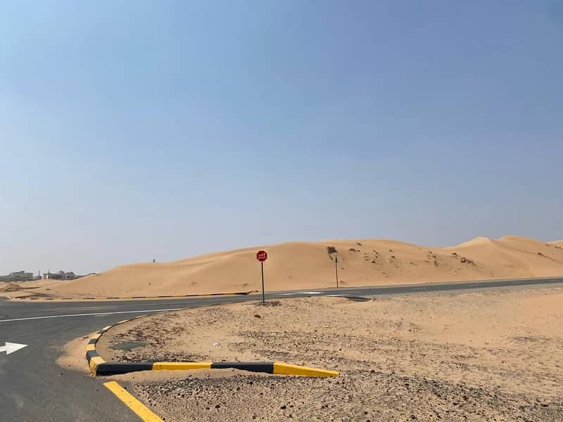 Land for sale in the Emirate of Sharjah, opposite Al Rahmaniyah