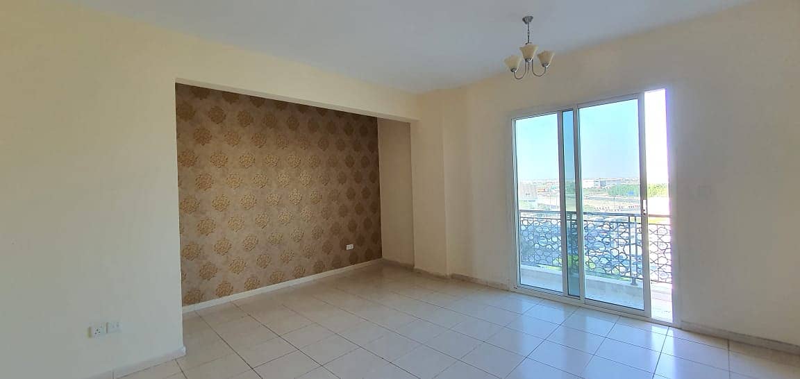 LARGE STUDIO WITH HANGING BALCONY FOR SALE IN EMIRATES CLUSTER