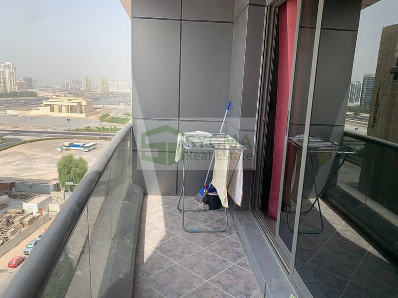 شقة في برج حمزة،مدينة دبي الرياضية 1 غرفة 410000 درهم - 6592949