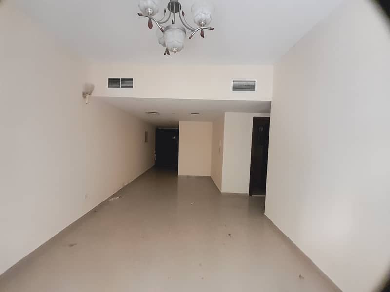 Spacious apartment 1bhk chiller free with  wardrobe Near to al Nahda park 6Cheques Rent 27k