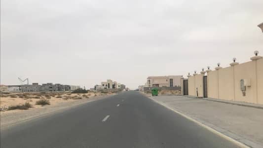 Plot for Sale in Hoshi, Sharjah - For sale a distinctive residential land near the main street