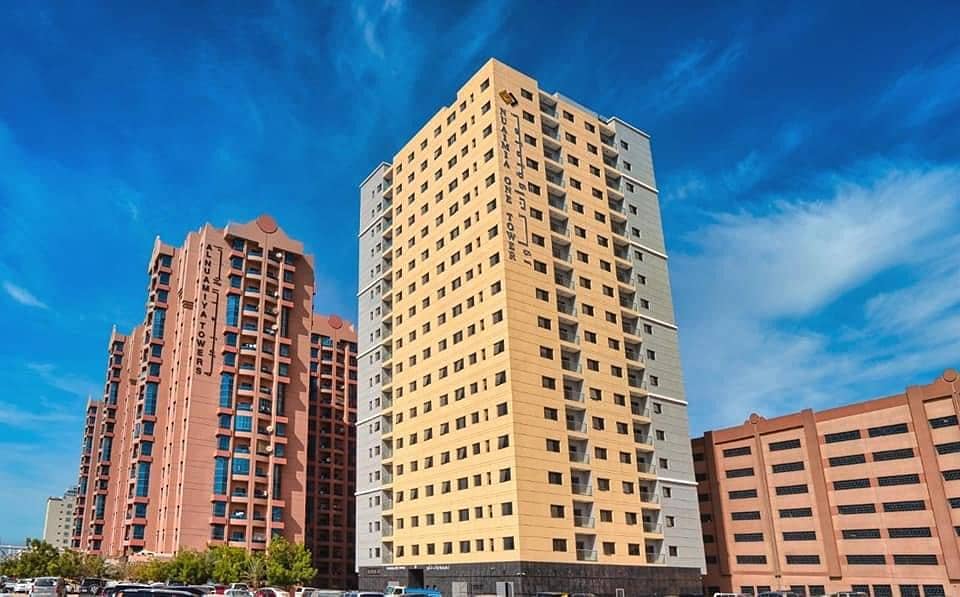 Own now in Al Nuaimiya, in a new tower, in direct installments over 7 years, with free air conditioning, without interest and registration fees