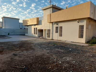 5 Bedroom Villa for Sale in Al Sabkha, Sharjah - Bam Khanour house for sale, the area is 9000 feet, the house specifications are 5 rooms, 5 bathrooms, a hall, and a majlis