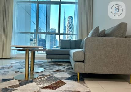 1 Bedroom Flat for Rent in Business Bay, Dubai - Living room with view