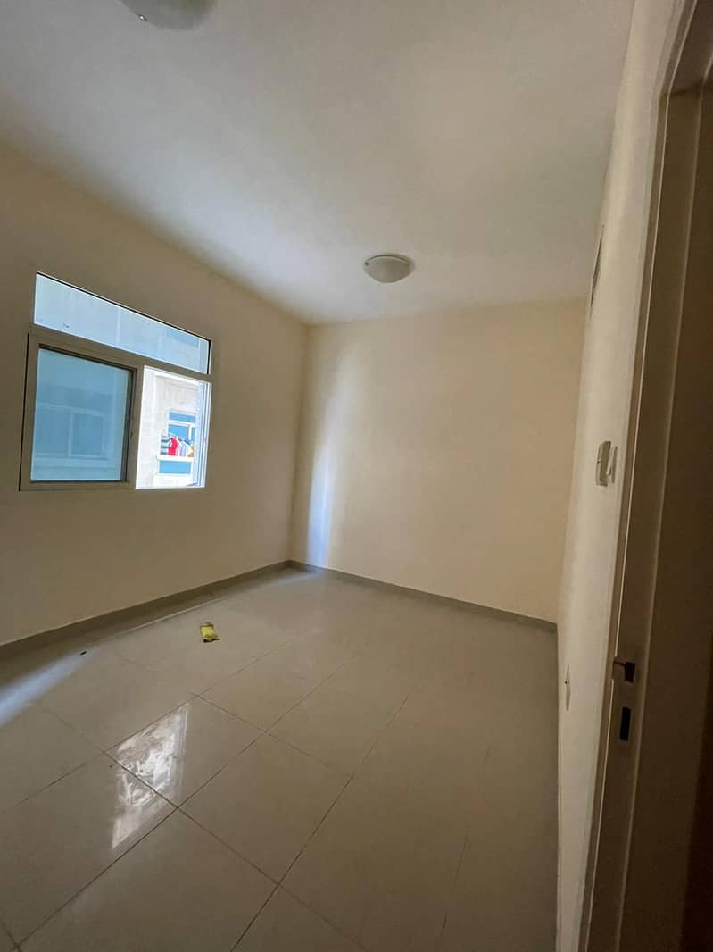 Hall room, 2 bathrooms, balcony, for annual rent, in Al Naimiya 1, next to Al Hikma School