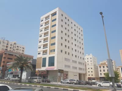 Building for Sale in Al Qulayaah, Sharjah - For sale building Ground + 2 parking + 7 floors 2 years old  nice location