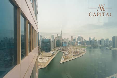 Office for Sale in Business Bay, Dubai - Full Canal and Burj View | Fitted | High Floor