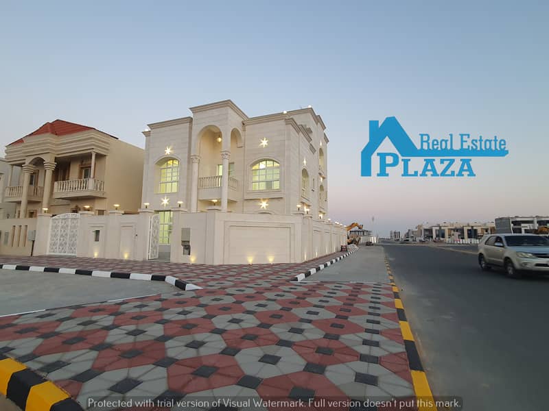 Villa for sale on two streets in the Al-Alia area, opposite Al-Raqayeb, Ajman, at an excellent price, without down payment, and in installments, with