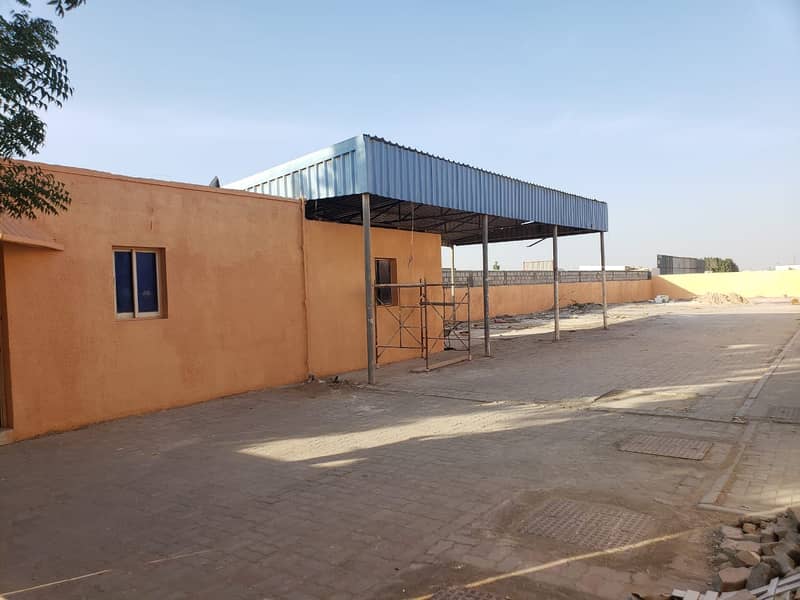 BEST OFFER BIG OPEN YARD 15,000/SQFT  WITH BOUNDRY WALL WITH ELECTRICITY AND WATER AL SAJAA AREA
