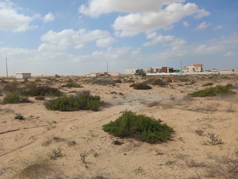For sale residential land on the street and opposite Al-Siuh Park in Al-Tayy area in Sharjah