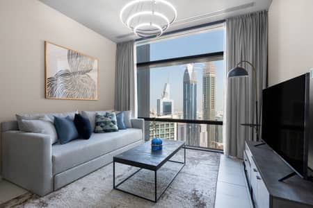 شقة 1 غرفة نوم للايجار في مركز دبي المالي العالمي، دبي - Living room