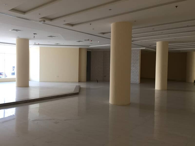 For sale, a building in Bahman Al Rashidiya, open spaces suitable for all commercial activities