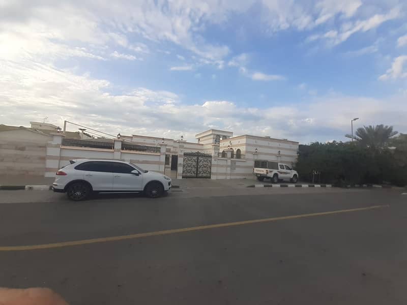 Villa for sale in Sharjah, Al Shahba, the corner of two Qar streets, excell