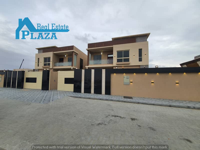 For sale, the most luxurious villa in Ajman, Al-Alia area, opposite Al-Raqayeb, on an area of ​​5200 feet, super deluxe finishing, with split air cond