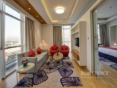 1 Bedroom Hotel Apartment for Rent in Business Bay, Dubai - Accessible Location | Housekeeping Services | Spacious 1 BR Hotel Apartment