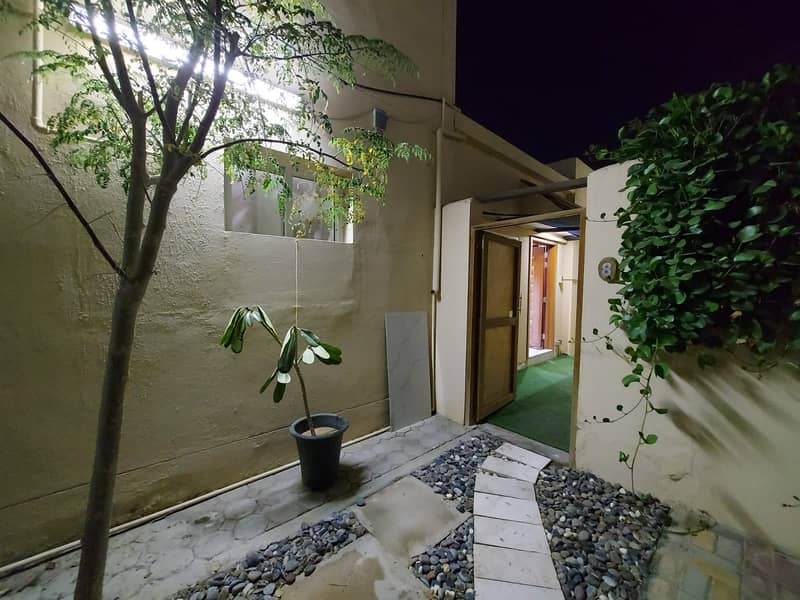 Beautiful 2 bedroom hall with private yard and prime location in Al Shamkha