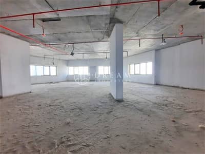 Office for Rent in Motor City, Dubai - Shell and Core | Spacious | Prime Location