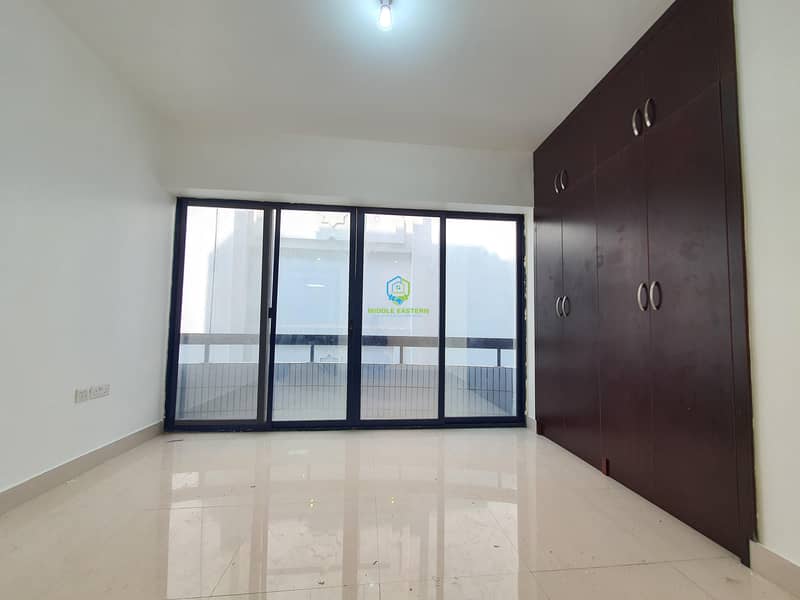 Shinny One Bedroom Hall with Built-in Wardrobes & Balcony including Full Bathroom and Nice Good Kitchen with Central AC.