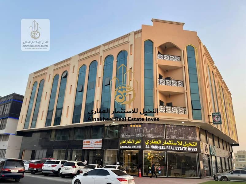 New building, corner of two streets, for sale Al Tallah 2 - Emirate of Ajman.