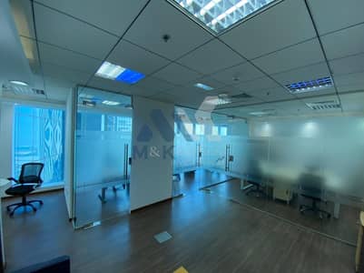 Office for Rent in Business Bay, Dubai - 3 Glass partitions | SZR and Seaview | with Furniture