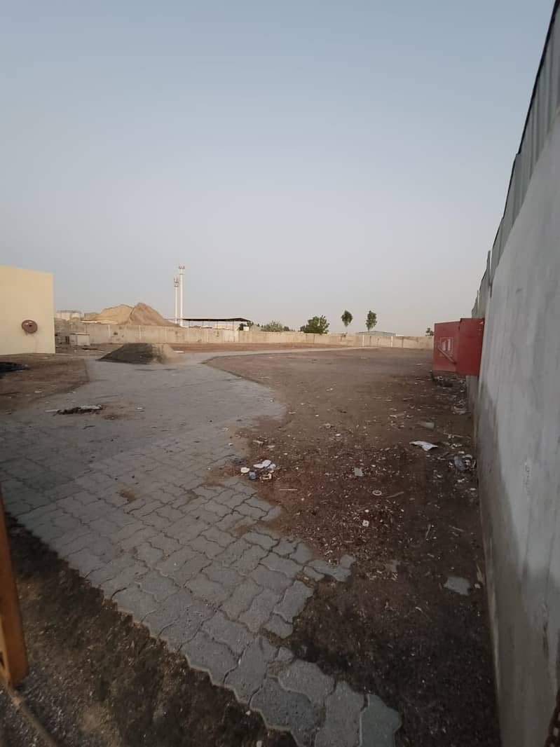 20,000SQFT OPENLAND WITH ELECTRICITY CONNECTION AVAILABLE IN SAJAA INDUSTRIAL AREA.
