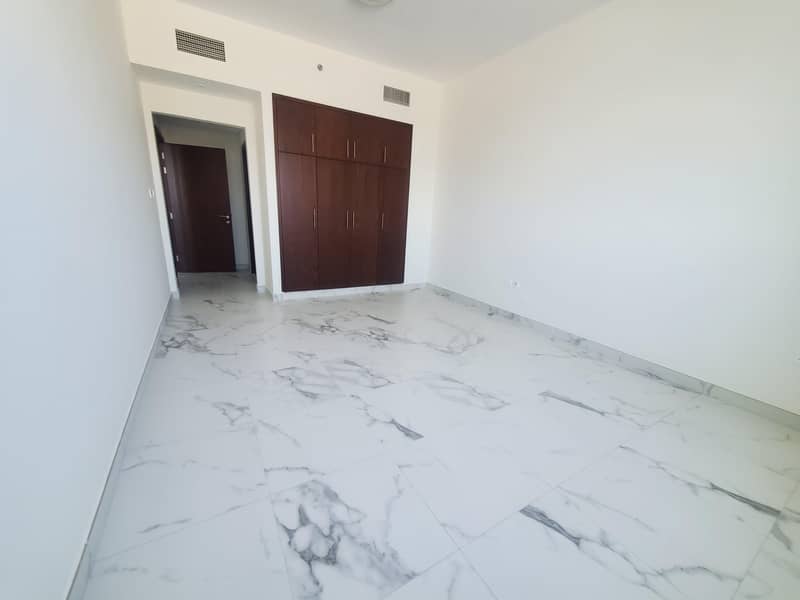 Spacious brand new  1 master bedroom apartment with maidroom in baniyas east