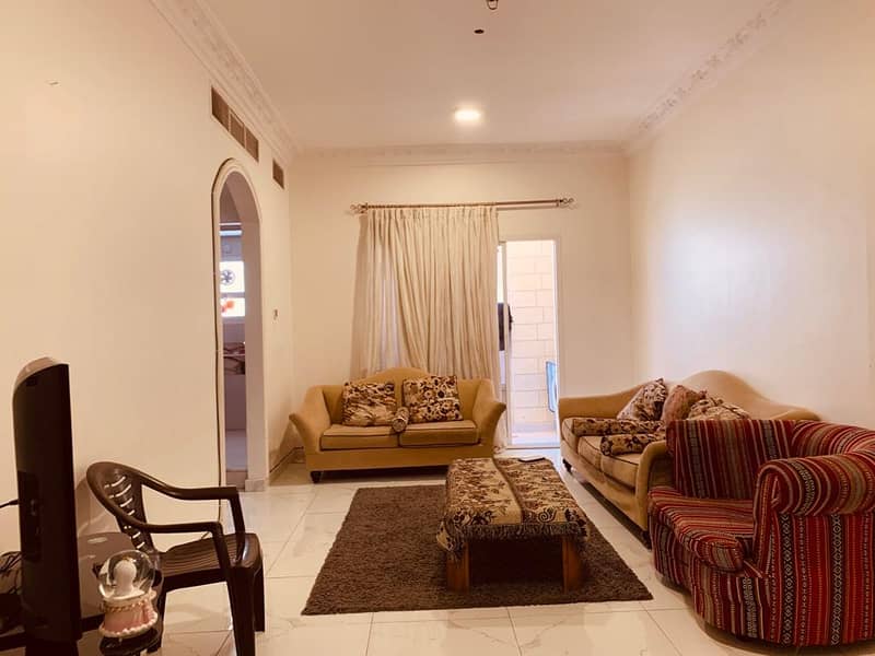 For monthly rent, two rooms and a hall in Ajman, furnished