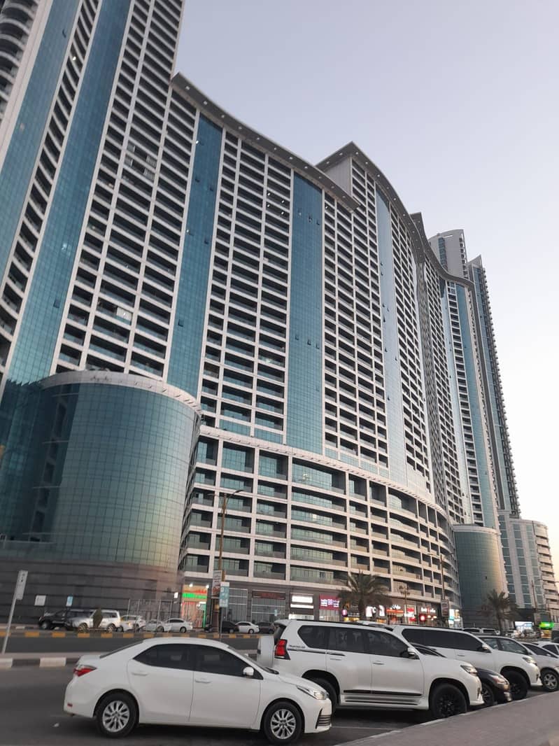 FULL SEA VIEW 2 BHK FOR RENT IN CORNICHE TOWER AJMAN WITH COVERED PARKING ( CHILLER FREE )
