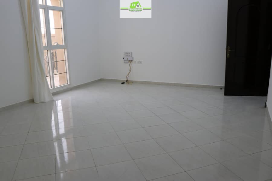 Spacious 1- bedroom hall W/ back yard in khalifa city B (( SHAKPOUT CITY )) .