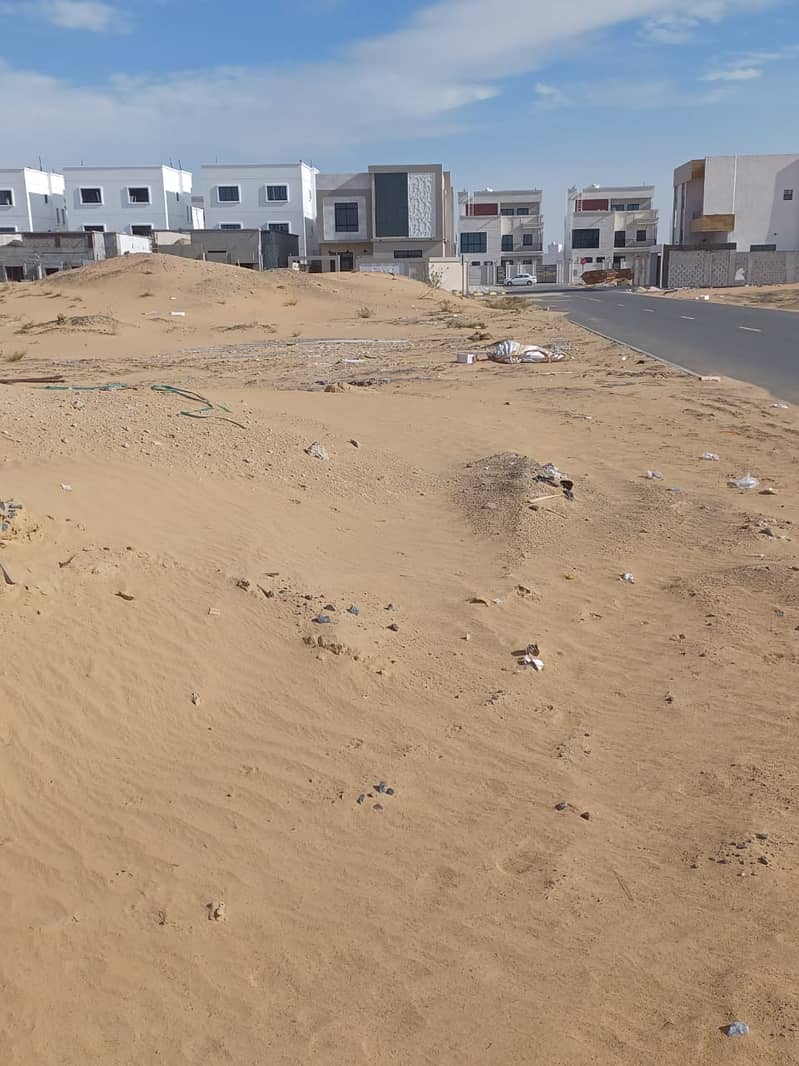 plots of commercial residential land for sale Ajman Al Jurf 3 area of one piece 900 meters