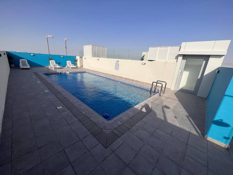 A room and a hall, two bathrooms, a swimming pool, and a gym with a balcony, in the Khalifa area, an excellent location