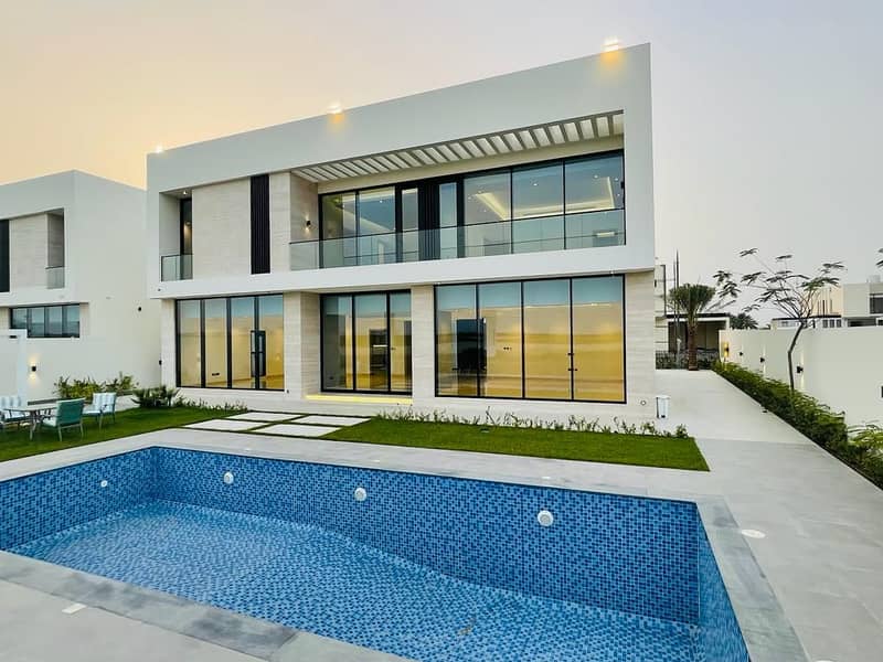 Modern villa for sale, excellent finishes, in a private compound in Ajman, in a very excellent location in Al Zorah.