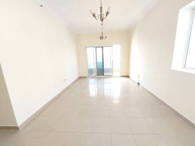 PARKING  + ONE MONTH  + GYM POOL FREE  / MASTER BEDROOM / SPACIOUS 2BHK WITH BALCONY CLOSE TO AL NAHDA PARK