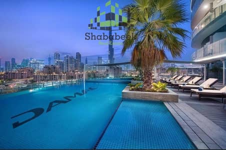 فلیٹ 2 غرفة نوم للبيع في وسط مدينة دبي، دبي - شقة في ذا ديستنكشن وسط مدينة دبي 2 غرف 2500000 درهم - 6508071