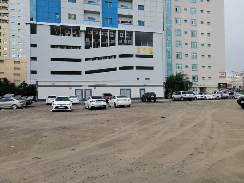 A residential and commercial plot of land with an area of ​​10,591 square feet in Al Nuaimiya