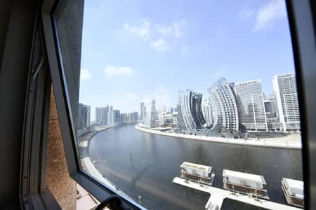 Studio for Rent in Business Bay, Dubai - Fantastic Lake View | Large Studio | Highly Maintained