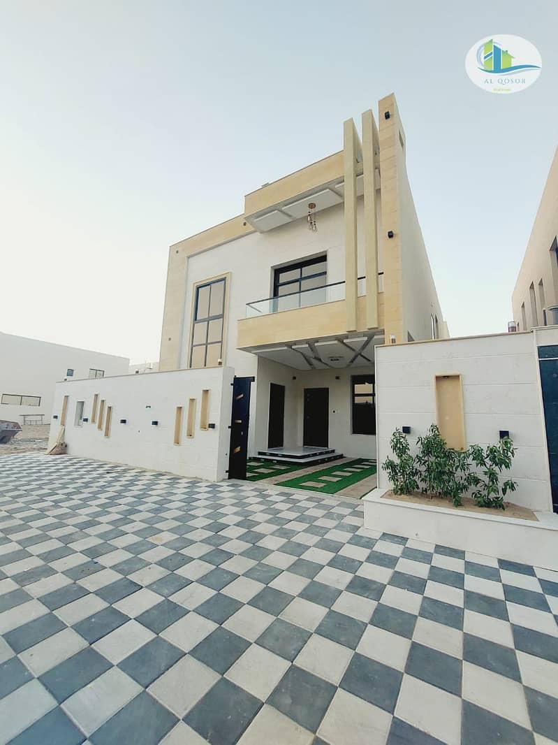 Next to Ajman Mosque, and from the services area, two floors, facing stone, modern super deluxe