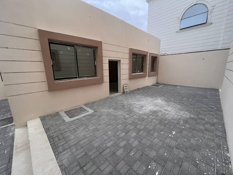 For rent a room and a hall in a yard, the first inhabitant in the city of South Al Shamkha, monthly, excellent location