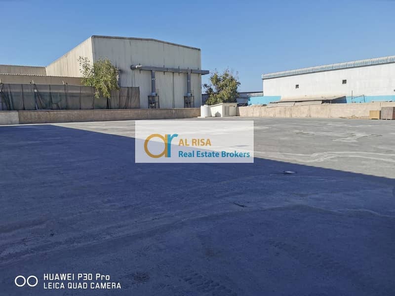 Paved & Fenced Plot with Warehouse at Al Quoz