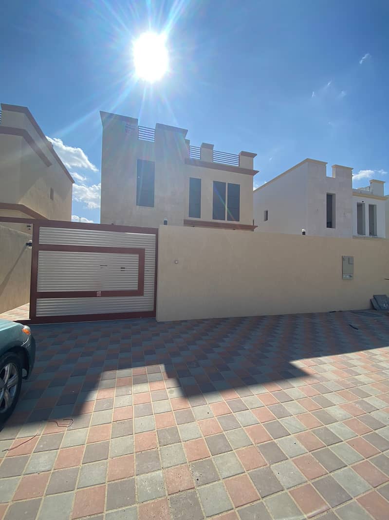 BRAND NEW VILLA LOCATED ON ROAD AVAILBLE FOR RENT 3 BEDROOMS WITH MAJLIS HALL IN AL YASMEEN IN 65,000/- AED YEARLY