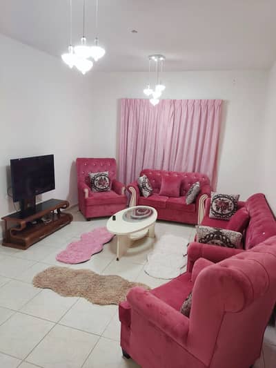 1 Bedroom Flat for Rent in Al Taawun, Sharjah - A large room and hall, 2 bathrooms, and a furnished balcony with clean brushes
