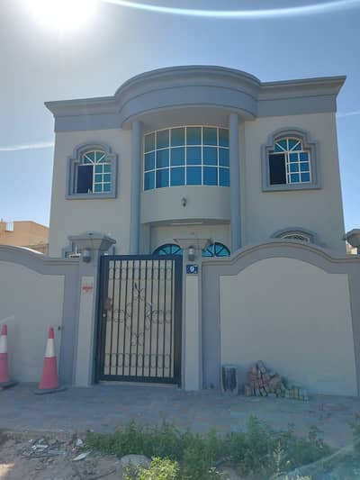 Modern villa in Al Rawda 2 for rent at an attractive price .