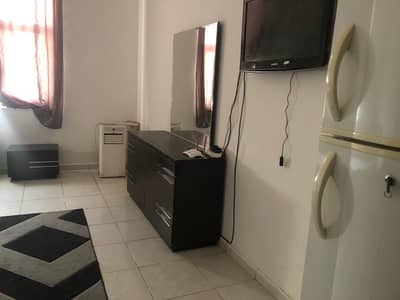 Studio for Rent in Ajman Downtown, Ajman - Furnished studio, including everything, a spacious area, central air conditioning, close to all services, to Al Safeer Mall