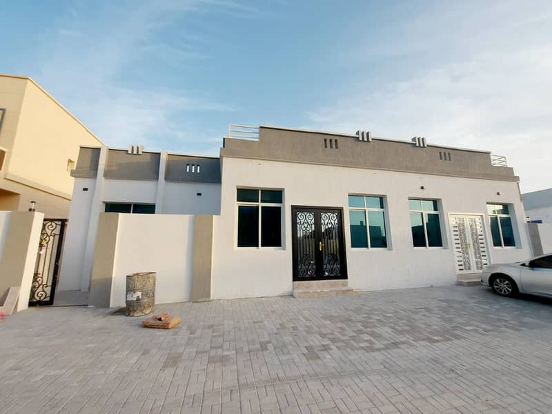 Freehold villa, with excellent finishing, on a main street, next to a mosque, in Al-Zahia area, next to Sheikh Mohammed bin Zayed Street
