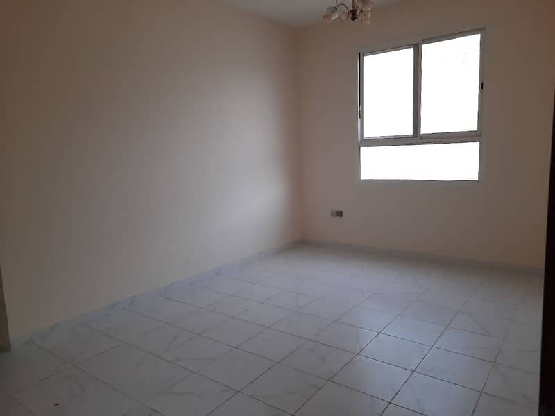 One room apartment and hall in a new building in Al Nuaimiya 2, Ajman. Take the initiative to book for annual rent, second inhabitant, close to Kuwait