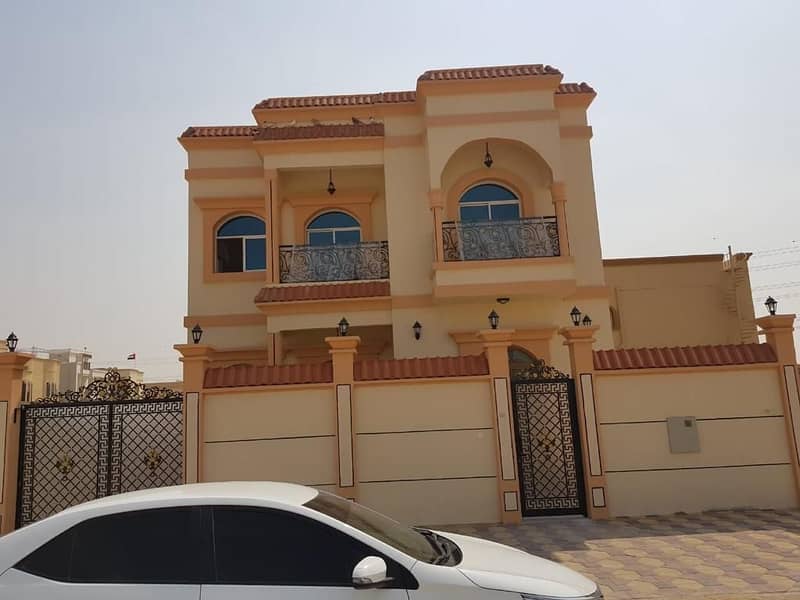 For sale villa in the Emirate of Ajman, a corner on two streets, a stone in full, a very impressive villa, a large area villa on an asphalt street